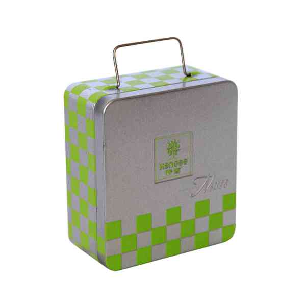 Small tin box with handle